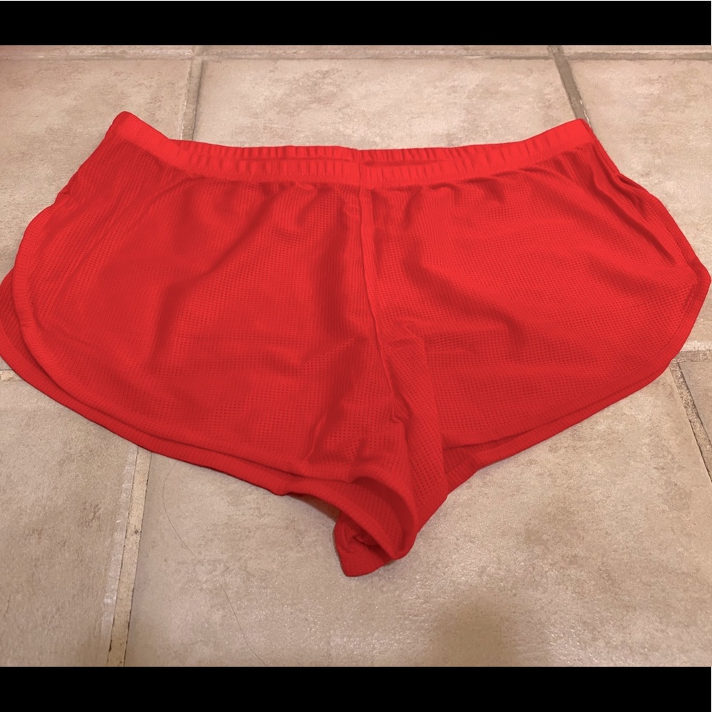 Red short (sheer!) trunks for gym show-off. 😏